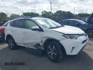 2018 Toyota RAV4 XLE with VIN JTMWFREV7JJ731893, listed as a IAAI auction lot 41567850 with 141,269 mi miles. Bid and sale history available at carsss.com. Image 6.