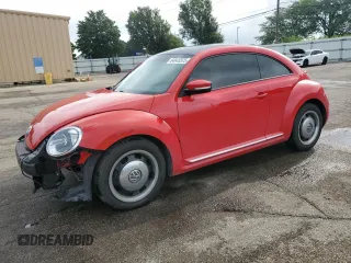 2012 Volkswagen Beetle 2.5L with VIN 3VWJX7AT1CM654554, listed as a Copart auction lot 64645375 with 89,537 mi miles and Salvage title. Bid and sale history available at DreamBid. Image 1.