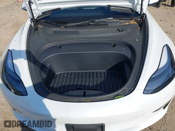 2023 Tesla Model 3 with VIN 5YJ3E1EA3PF617460, listed as a IAAI auction lot 42154401 with 9,578 mi miles and . Bid and sale history available at DreamBid. Image 10.