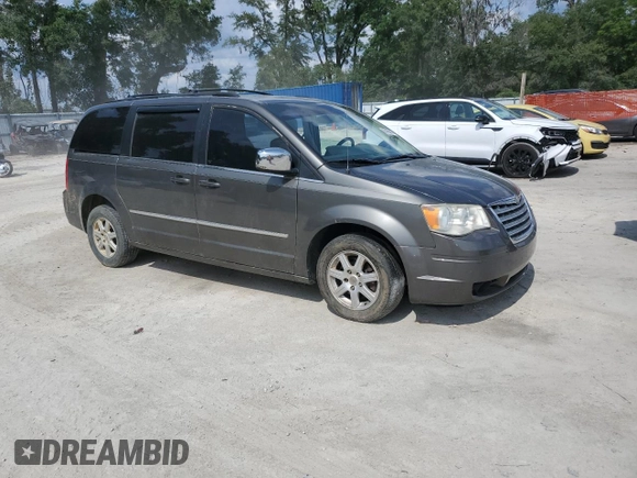 2010 Chrysler Town & Country Touring Plus with VIN 2A4RR8DX8AR382153, listed as a Copart auction lot 56470045 with 272,459 mi miles and Salvage Title. Bid and sale history available at DreamBid. Image 4.