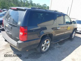 2011 Chevrolet Suburban LTZ with VIN 1GNSKKE31BR299912, listed as a IAAI auction lot 41990351 with 268,982 mi miles. Bid and sale history available at carsss.com. Image 4.