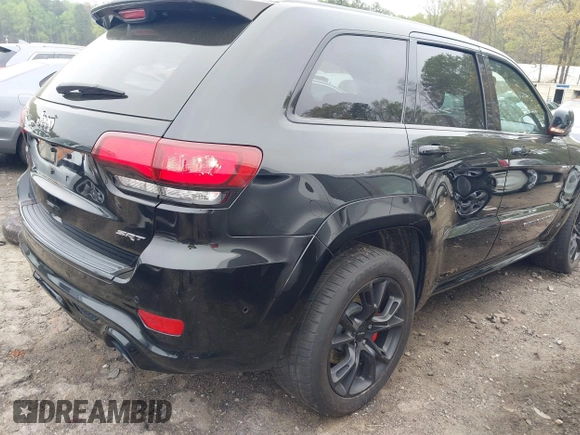2017 Jeep Grand Cherokee SRT z VIN 1C4RJFDJ7HC683240, wystawiony jako IAAI lot #41919995 z przebiegiem 122 030 mil mil oraz . Historia ofert i sprzedaży dostępna na DreamBid. Obrazek 4.
