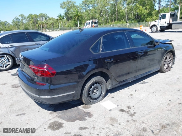 2018 Volkswagen Passat 2.0T S with VIN 1VWAA7A33JC009677, listed as a IAAI auction lot 41796723 with 63,151 mi miles. Bid and sale history available at carsss.com. Image 4.