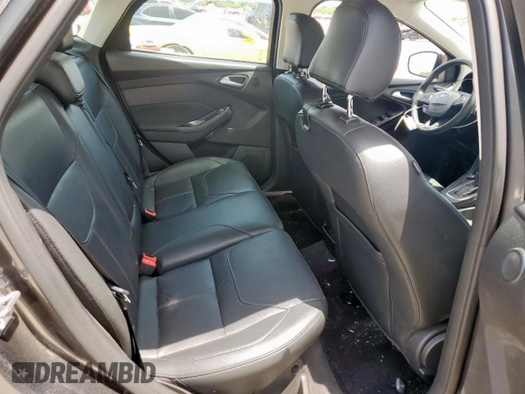 2017 Ford Focus Titanium with VIN 1FADP3J20HL253446, listed as a Copart auction lot 64196895 with 150,633 mi miles and Salvage title. Bid and sale history available at DreamBid. Image 10.