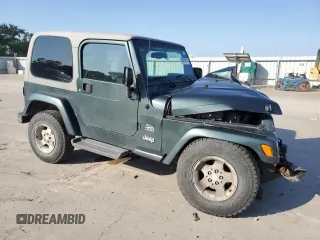 2003 Jeep Wrangler Sahara with VIN 1J4FA59S93P376775, listed as a Copart auction lot 53979415 with 93,995 mi miles and Salvage title. Bid and sale history available at DreamBid. Image 4.
