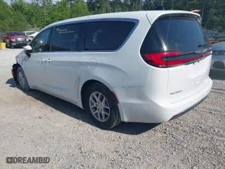 2023 Chrysler Pacifica Touring L with VIN 2C4RC1BG0PR616151, listed as a IAAI auction lot 42044983 with 40,152 mi miles. Bid and sale history available at carsss.com. Image 3.