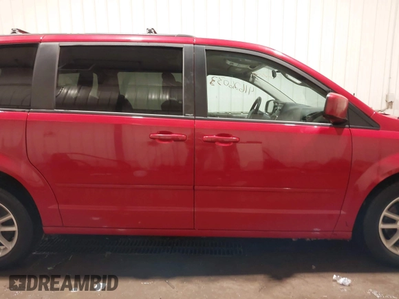 2013 Dodge Grand Caravan SXT with VIN 2C4RDGCG9DR669053, listed as a IAAI auction lot 41626033 with 170,007 mi miles and . Bid and sale history available at DreamBid. Image 14.