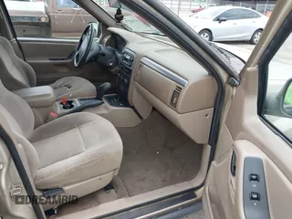 2001 Jeep Grand Cherokee Laredo with VIN 1J4GW48S51C566319, listed as a IAAI auction lot 42184875 with 148,471 mi miles and . Bid and sale history available at DreamBid. Image 5.