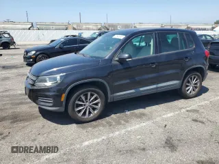 2014 Volkswagen Tiguan SE with VIN WVGAV3AX1EW502809, listed as a Copart auction lot 61843655 with 115,668 mi miles and Salvage title. Bid and sale history available at DreamBid. Image 1.
