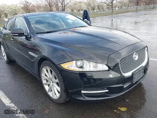 2011 Jaguar XJ with VIN SAJWA1CB8BLV12389, listed as a IAAI auction lot 41957217 with 51,585 mi miles. Bid and sale history available at carsss.com. Image 1.