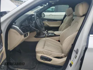 2017 BMW X5 xDrive35i with VIN 5UXKR0C56H0V68771, listed as a Copart auction lot 59587015 with 164,990 mi miles and Salvage title. Bid and sale history available at DreamBid. Image 7.