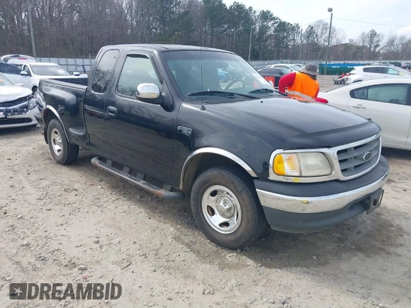 2000 Ford F-150 XL with VIN 1FTZX0725YKA09559, listed as a IAAI auction lot 41810954 with Not provided miles and . Bid and sale history available at DreamBid. Image 1.