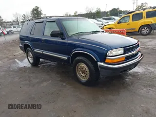 2001 Chevrolet Blazer LT z VIN 1GNDT13WX12208639, wystawiony jako IAAI lot #41673030 z przebiegiem 164 093 mil mil oraz . Historia ofert i sprzedaży dostępna na DreamBid. Obrazek 1.