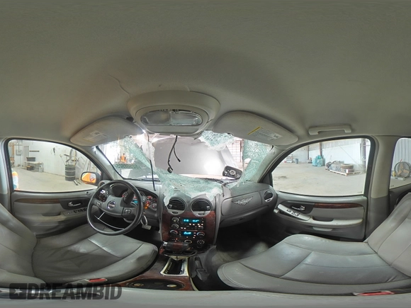2005 GMC Envoy SLT z VIN 1GKDT13S652287033, wystawiony jako Copart lot #52508925 z przebiegiem 170 434 mil mil oraz Szkoda całkowita • Salvage title. Historia ofert i sprzedaży dostępna na DreamBid. Obrazek 14.
