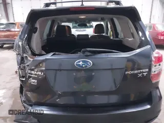 2014 Subaru Forester 2.0XT Touring with VIN JF2SJGPC7EH425711, listed as a IAAI auction lot 41549382 with 119,039 mi miles. Bid and sale history available at carsss.com. Image 16.