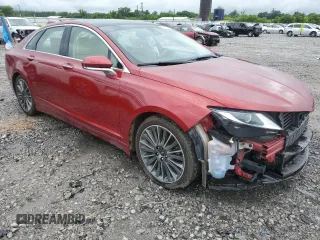 2014 Lincoln MKZ Hybrid with VIN 3LN6L2LU3ER820670, listed as a Copart auction lot 57949235 with 122,042 mi miles and Salvage title. Bid and sale history available at DreamBid. Image 4.