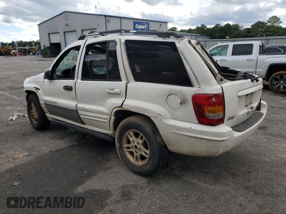 1999 Jeep Grand Cherokee Limited with VIN 1J4G268S2XC756532, listed as a Copart auction lot 71222174 with 279,300 mi miles and Salvage title. Bid and sale history available at DreamBid. Image 2.