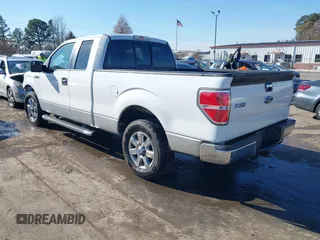 2014 Ford F-150 XL with VIN 1FTEX1CM3EFB94081, listed as a IAAI auction lot 40991423 with 190,785 mi miles. Bid and sale history available at carsss.com. Image 3.