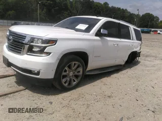 2015 Chevrolet Tahoe LTZ z VIN 1GNSKCKC5FR177134, wystawiony jako IAAI lot #41460583 z przebiegiem 202 924 mil mil oraz . Historia ofert i sprzedaży dostępna na DreamBid. Obrazek 2.