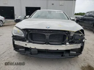2015 BMW 7 Series 750Li z VIN WBAYE8C56FD781213, wystawiony jako Copart lot #55843955 z przebiegiem 63 899 mil mil oraz Szkoda całkowita • Salvage title. Historia ofert i sprzedaży dostępna na DreamBid. Obrazek 5.