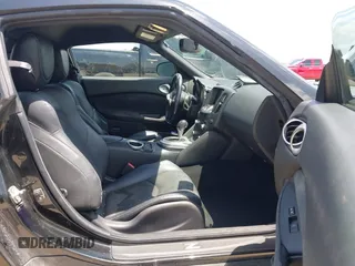 2012 Nissan 370Z z VIN JN1AZ4EH1CM564630, wystawiony jako IAAI lot #42177880 z przebiegiem 173 751 mil mil oraz . Historia ofert i sprzedaży dostępna na DreamBid. Obrazek 5.