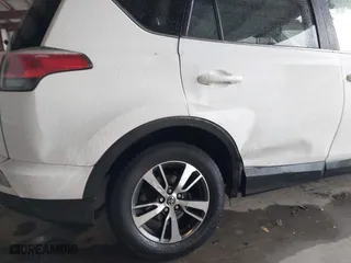 2018 Toyota RAV4 XLE with VIN JTMRFREV6JD222115, listed as a IAAI auction lot 41505367 with 118,126 mi miles. Bid and sale history available at carsss.com. Image 6.