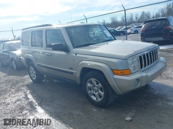 2007 Jeep Commander Sport z VIN 1J8HG48KX7C669647, wystawiony jako IAAI lot #41607617 z przebiegiem 333 861 mil mil oraz . Historia ofert i sprzedaży dostępna na DreamBid. Obrazek 1.