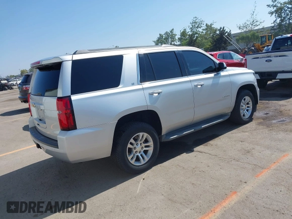 2015 Chevrolet Tahoe LT z VIN 1GNSCBKC2FR145619, wystawiony jako IAAI lot #42630761 z przebiegiem 138 287 mil mil oraz . Historia ofert i sprzedaży dostępna na DreamBid. Obrazek 4.