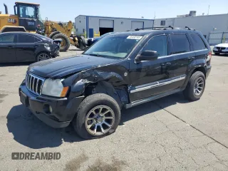 2005 Jeep Grand Cherokee Limited with VIN 1J8HR58265C699077, listed as a Copart auction lot 58490185 with 163,280 mi miles and Salvage title. Bid and sale history available at DreamBid. Image 1.