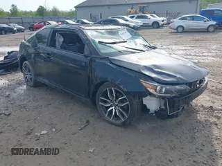 2015 Scion tC z VIN JTKJF5C77F3095181, wystawiony jako IAAI lot #42161130 z przebiegiem 144 568 mil mil oraz . Historia ofert i sprzedaży dostępna na DreamBid. Obrazek 1.