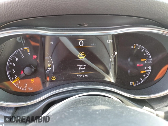 2020 Jeep Grand Cherokee Laredo E with VIN 1C4RJEAG2LC379633, listed as a Copart auction lot 58437555 with 57,219 mi miles and Salvage title. Bid and sale history available at DreamBid. Image 9.