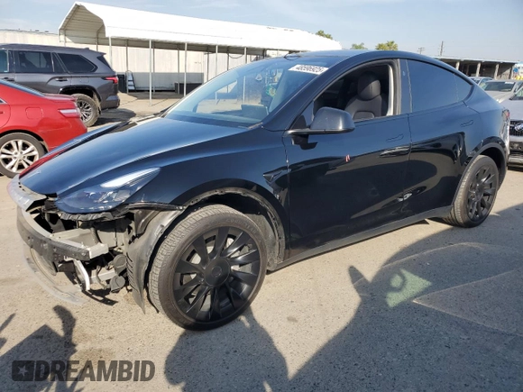 2023 Tesla Model Y Long Range with VIN 7SAYGDEE5PF834645, listed as a Copart auction lot 48596925 with 26,896 mi miles and Salvage Title. Bid and sale history available at DreamBid. Image 1.