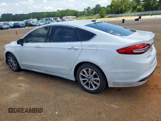 2017 Ford Fusion SE z VIN 3FA6P0H77HR235214, wystawiony jako Copart lot #63560815 z przebiegiem 273 965 mil mil oraz Szkoda całkowita • Salvage title. Historia ofert i sprzedaży dostępna na DreamBid. Obrazek 2.