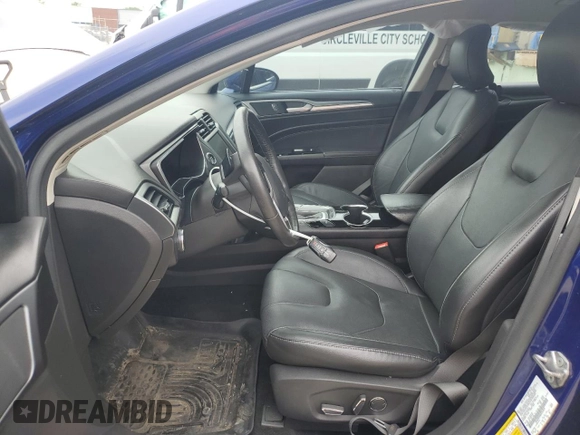 2016 Ford Fusion Titanium with VIN 3FA6P0D90GR232029, listed as a Copart auction lot 57096045 with 90,694 mi miles and Salvage title. Bid and sale history available at DreamBid. Image 7.