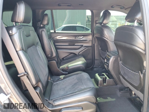 2023 Jeep Grand Cherokee Laredo with VIN 1C4RJKAG8P8751144, listed as a Copart auction lot 59958545 with 29,727 mi miles and Salvage title. Bid and sale history available at DreamBid. Image 11.