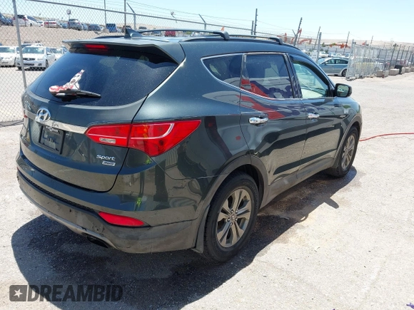 2014 Hyundai Santa Fe with VIN 5XYZUDLB9EG169614, listed as a IAAI auction lot 42208166 with 139,103 mi miles and . Bid and sale history available at DreamBid. Image 4.