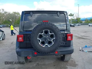 2023 Jeep Wrangler Rubicon with VIN 1C4HJXFGXPW534515, listed as a IAAI auction lot 41524419 with 21,376 mi miles and . Bid and sale history available at DreamBid. Image 16.