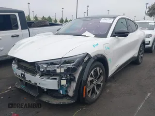 2022 Ford Mustang Mach-E Premium z VIN 3FMTK3RM6NMA42672, wystawiony jako IAAI lot #42432786 z przebiegiem 38 811 mil mil oraz . Historia ofert i sprzedaży dostępna na DreamBid. Obrazek 21.