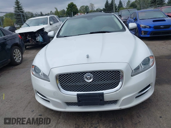 2013 Jaguar XJ Portfolio with VIN SAJWJ2GD3D8V48238, listed as a IAAI auction lot 40435160 with 136,738 mi miles and . Bid and sale history available at DreamBid. Image 12.