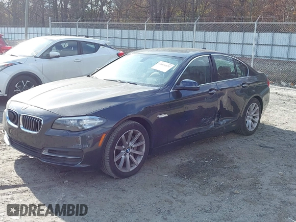 2014 BMW 5 Series 535d with VIN WBAXA5C52ED689245, listed as a IAAI auction lot 41016152 with 95,392 mi miles and . Bid and sale history available at carsss.com. Image 17.