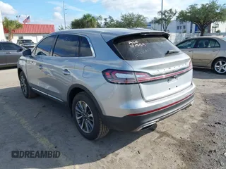 2023 Lincoln Nautilus Reserve z VIN 2LMPJ6K93PBL12705, wystawiony jako IAAI lot #38135775 z przebiegiem 7 269 mil mil oraz . Historia ofert i sprzedaży dostępna na DreamBid. Obrazek 3.