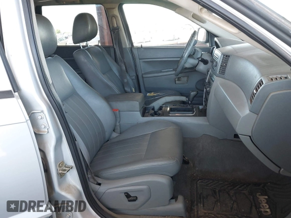 2005 Jeep Grand Cherokee Laredo z VIN 1J4HS48N65C563266, wystawiony jako IAAI lot #42784524 z przebiegiem 156 702 mil mil oraz . Historia ofert i sprzedaży dostępna na DreamBid. Obrazek 5.