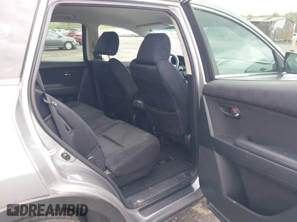 2015 Mazda CX-9 Sport with VIN JM3TB3BV2F0454770, listed as a IAAI auction lot 42009879 with 98,916 mi miles and . Bid and sale history available at carsss.com. Image 8.