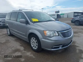 2016 Chrysler Town & Country Touring with VIN 2C4RC1BG0GR213058, listed as a IAAI auction lot 41910462 with 125,013 mi miles and . Bid and sale history available at DreamBid. Image 1.