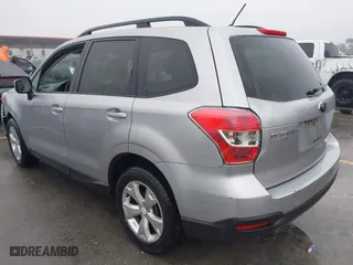 2015 Subaru Forester 2.5i Premium with VIN JF2SJADC2FH830877, listed as a IAAI auction lot 41594954 with 128,984 mi miles. Bid and sale history available at carsss.com. Image 3.