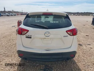 2016 Mazda CX-5 Sport with VIN JM3KE2BYXG0683318, listed as a IAAI auction lot 41777751 with 116,922 mi miles. Bid and sale history available at carsss.com. Image 16.
