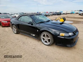2001 Ford Mustang GT Deluxe with VIN 1FAFP45X31F148246, listed as a Copart auction lot 63087385 with 114,051 mi miles and Salvage title. Bid and sale history available at DreamBid. Image 4.