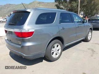 2012 Dodge Durango Crew with VIN 1C4RDHDG2CC317136, listed as a IAAI auction lot 41993837 with 131,048 mi miles and . Bid and sale history available at DreamBid. Image 4.