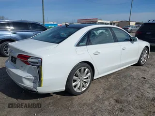 2017 Audi A8 L with VIN WAU44AFD0HN012571, listed as a IAAI auction lot 41717676 with 120,832 mi miles. Bid and sale history available at carsss.com. Image 4.