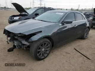 2014 Cadillac CTS AWD z VIN 1G6AW5SX0E0129778, wystawiony jako Copart lot #60615615 z przebiegiem 103 832 mil mil oraz Szkoda całkowita • Salvage title. Historia ofert i sprzedaży dostępna na DreamBid. Obrazek 1.